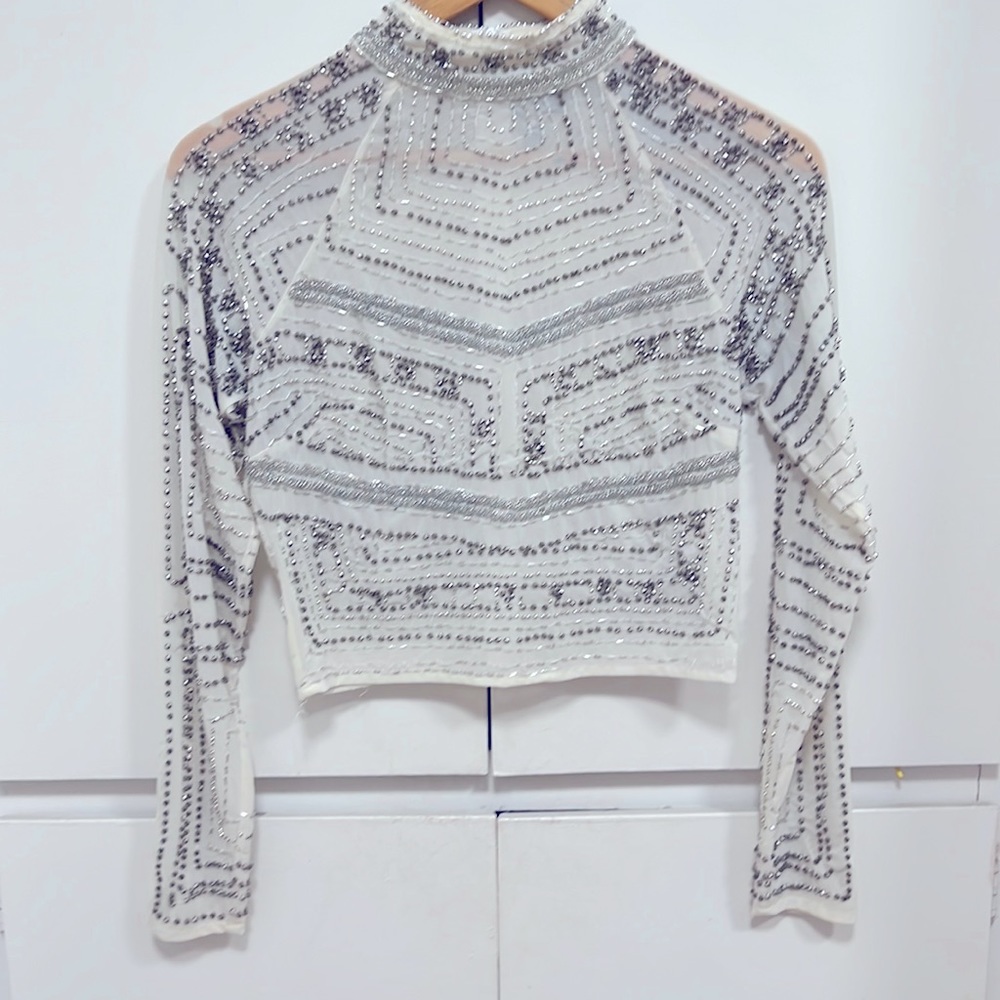 White sequin long sleeve Corp. top